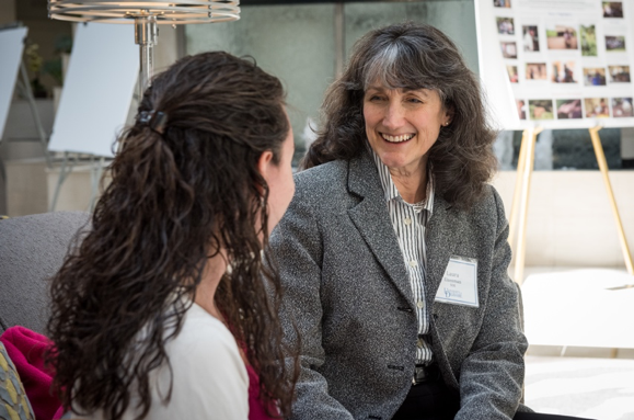 Laura Eisenman speaks with a student
