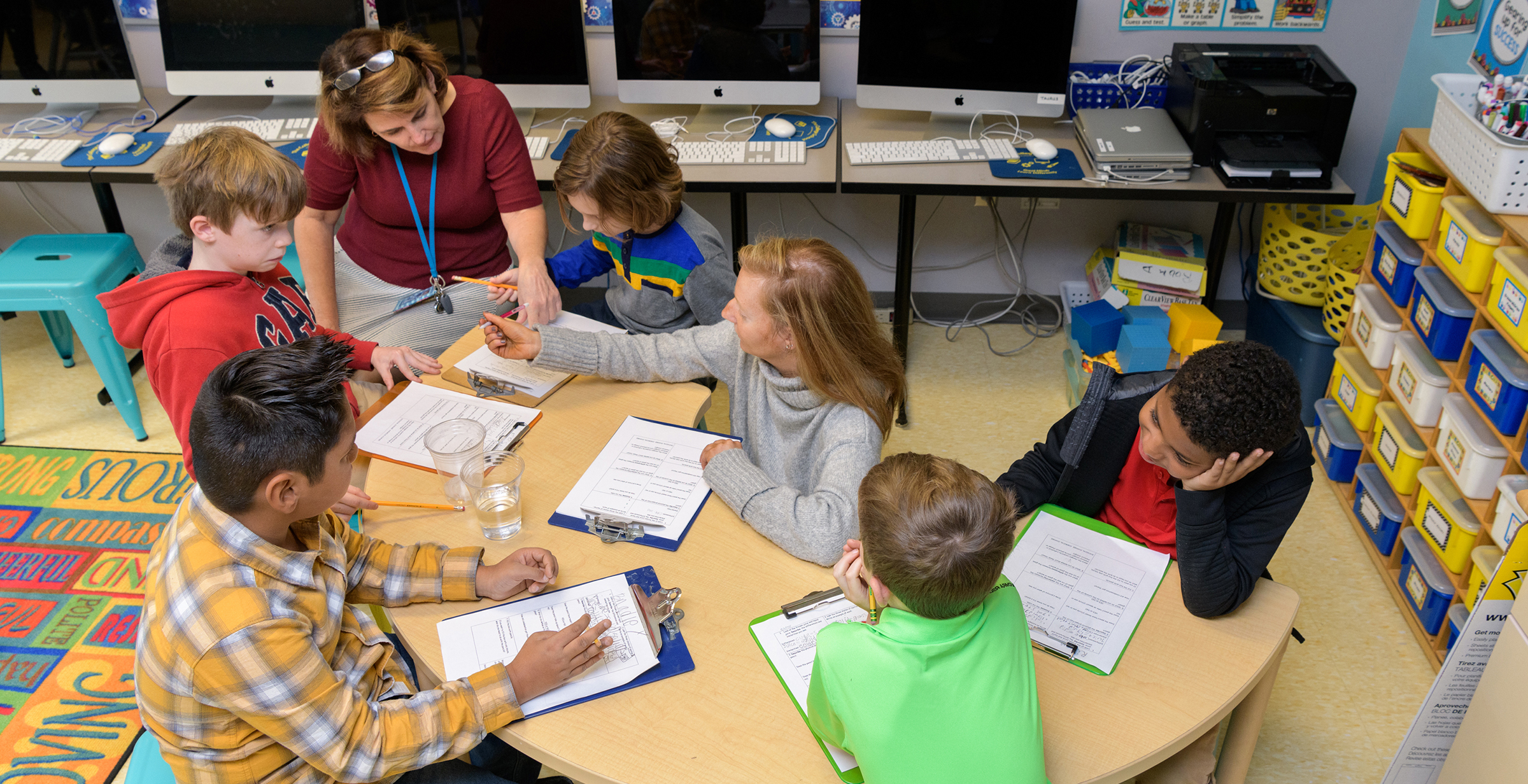 Co-teachers teaching science at the College School