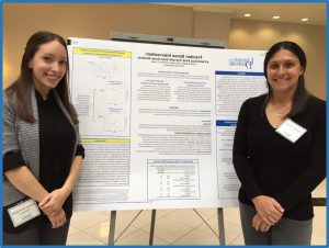 Jessica Rodrigues (left) and her poster at the Steele Symposium. She is with her student colleague Siobahn Young (Right)