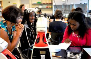 Dr. Voni Perrine (Left), with students at the academy. She is an assistant principal at Middletown High School in the Appoquinimink School District. Photo credit: Liliian Miles, Public Information Officer for the Appoqunimink School District.