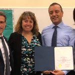 UD alumnus Nader Makarious is honored at the June 2018 Brandywine School District (BSD) board meeting. Pictured from left to right is Mark Holodick, superintendent of BSD, Michelle Kutch, supervisor of STEM, Science, and Social Studies at BSD, and Teri Quinn Gray, co-chair of the Delaware STEM Council.