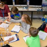 Co-teachers teaching science at the College School