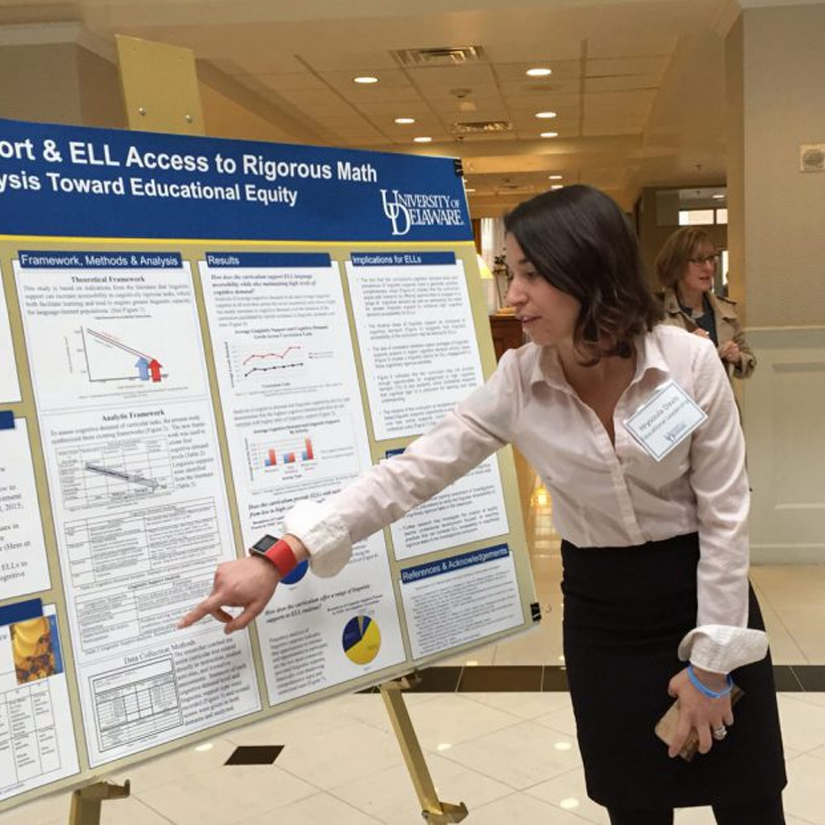 A graduate students presents her research.