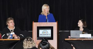 Lt. Gov. Bethany Hall-Long speaks at the first annual Women’s Leadership Conference Delaware, presented by the Delaware Academy for School Leadership (DASL) and the Partnership for Public Education. Sharing the stage are Jackie Wilson (left), director of DASL, and Alison Travers, program manager, DASL.