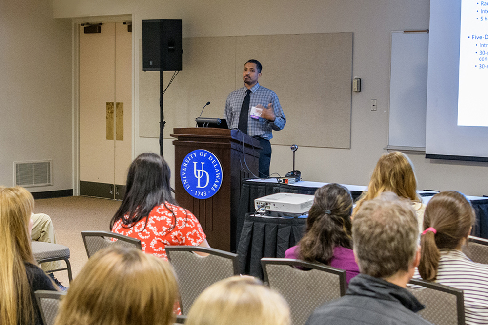 Graduate student Tony Mixell presents his research