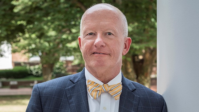 Portrait for Dean Gary Henry on the steps of Memorial Hall.