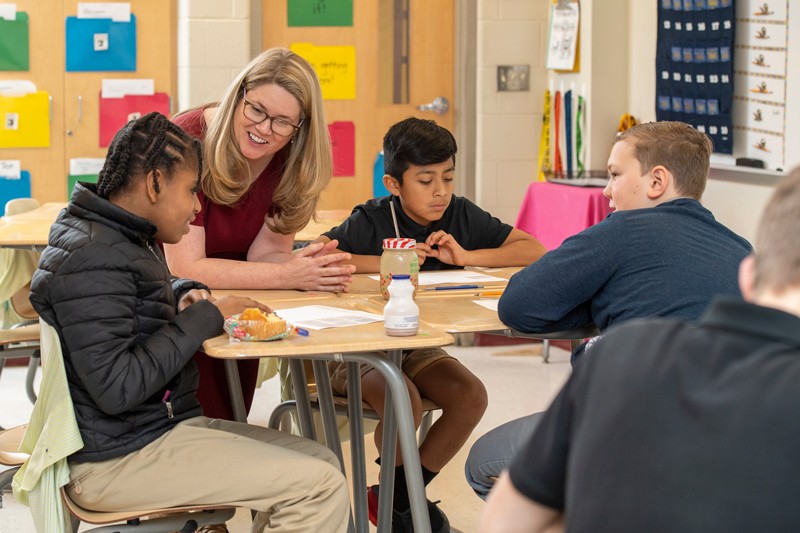 University of Delaware School of Education Professor Amanda Jansen speaks with students at Milford Central Academy. Jansen recently published a new book called, “Rough Draft Math: Revising to Learn.”