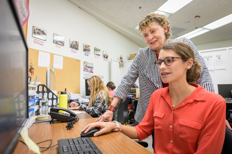 Roberta Micknick Golinkoff works with doctoral student Caroline Gaudreau in UD's Child's Play, Learning, and Development Lab.