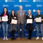 The student award winners with dean Gary T. Henry at CEHD's 2022 Steele Symposium.