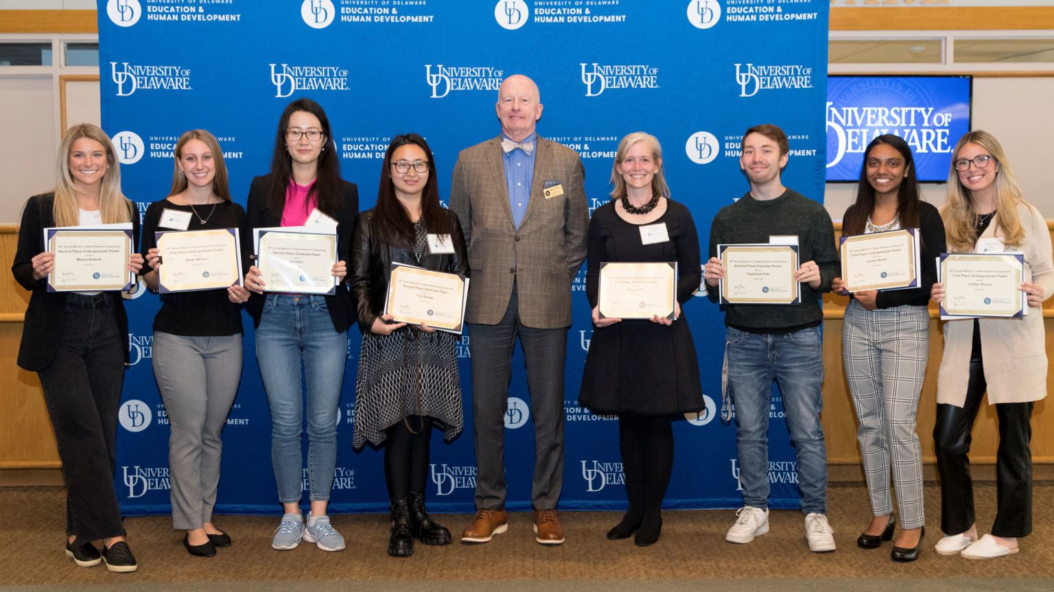 The student award winners with dean Gary T. Henry at CEHD's 2022 Steele Symposium.