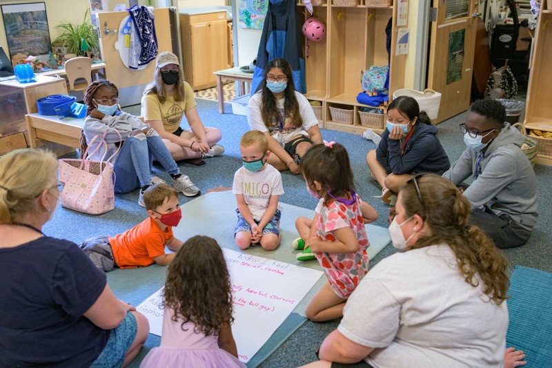 Teachers of Tomorrow group with campers at the UD Lab School