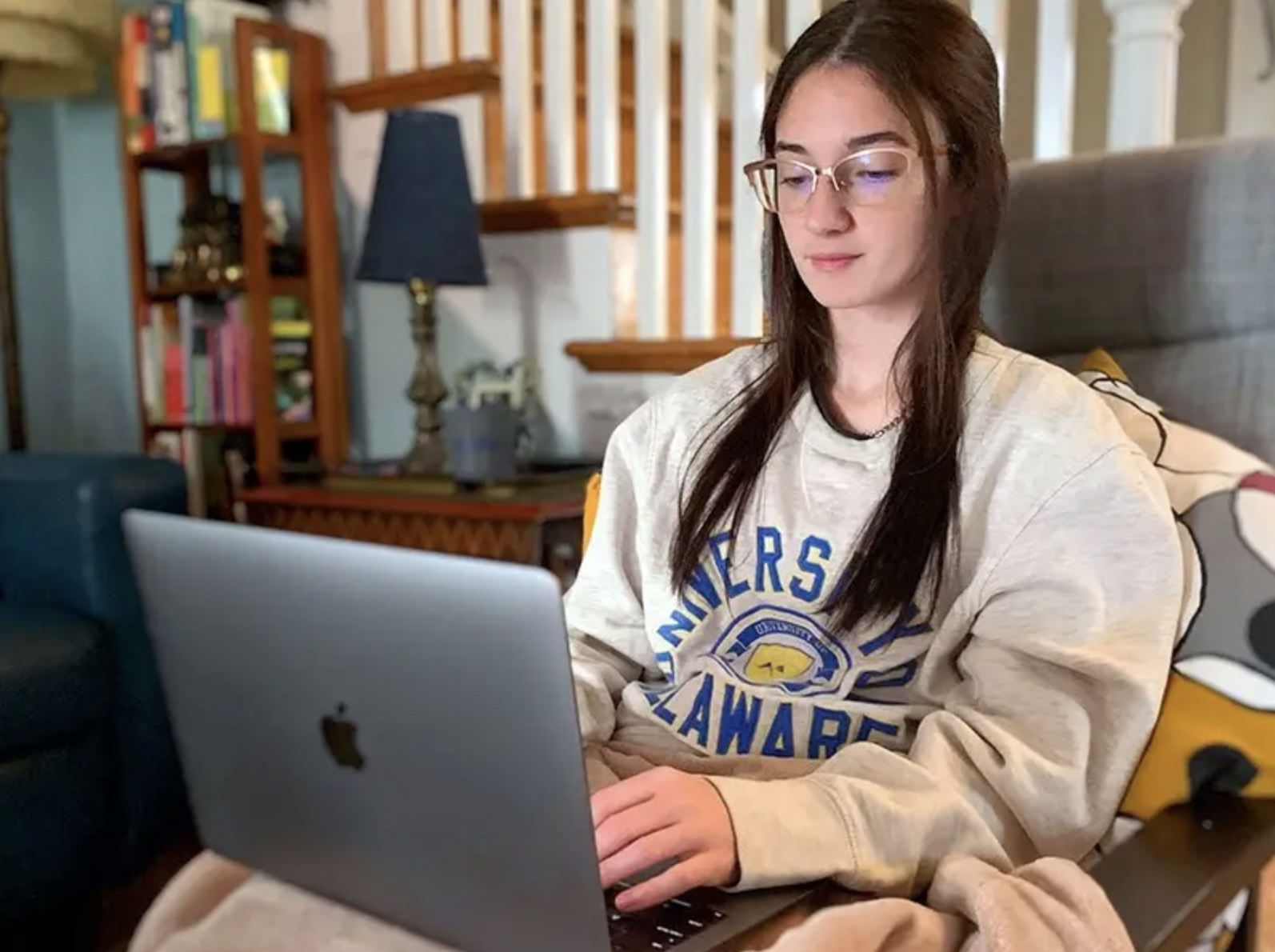 girl on her computer studying indoors